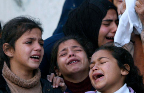 صور اطفال غزة تبكي لها العيون Bild-11